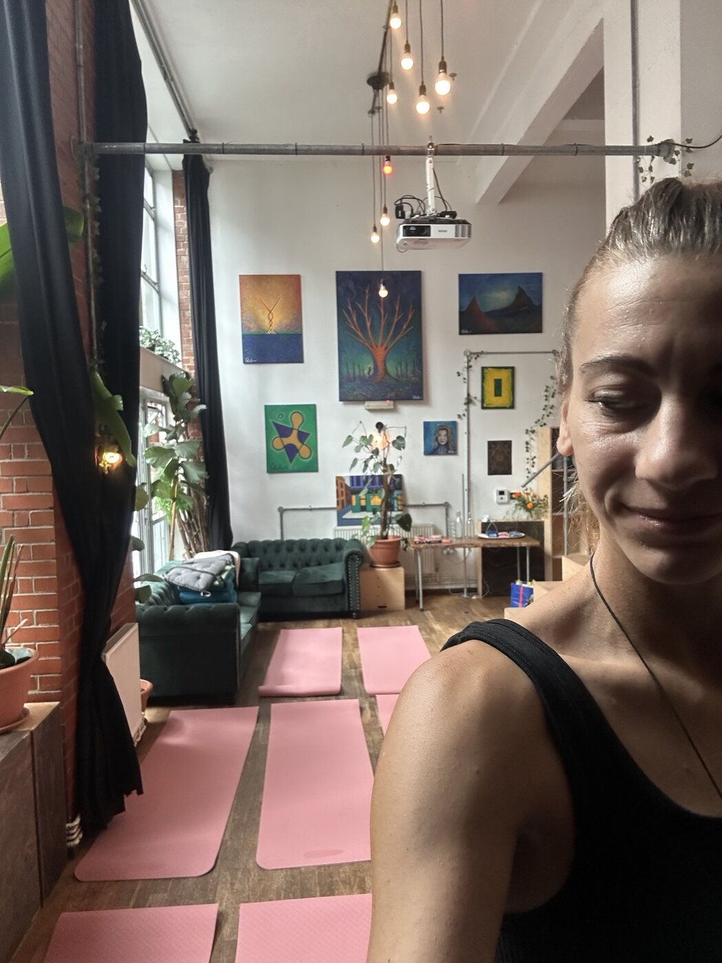 Vanessa preparing the yoga space before the retreat day