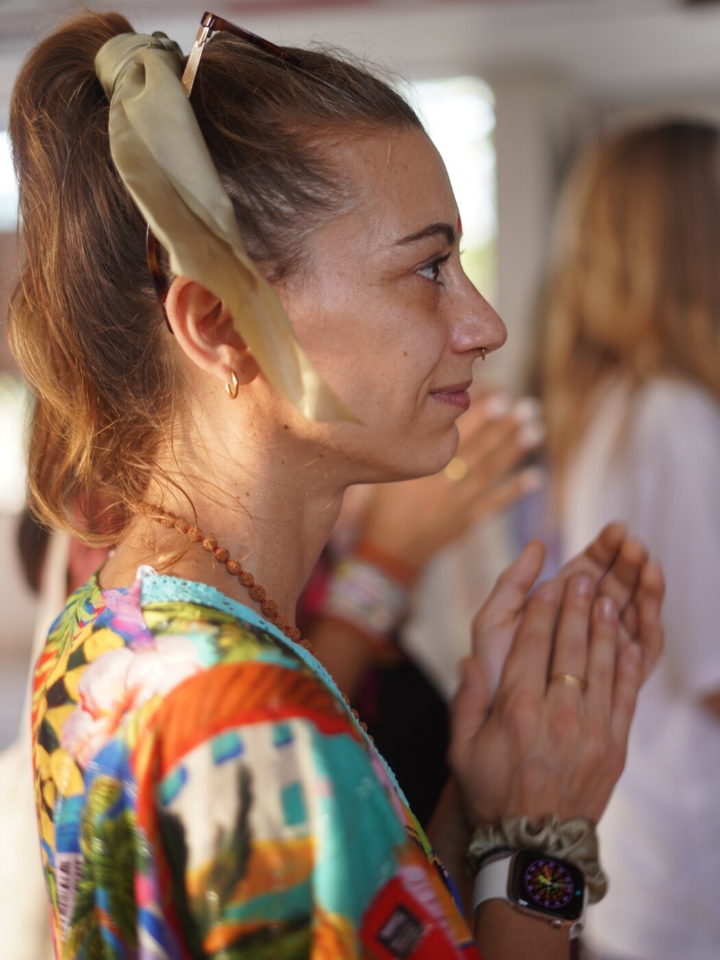 Vanessa practising Anjali Mudra during her yoga teacher training